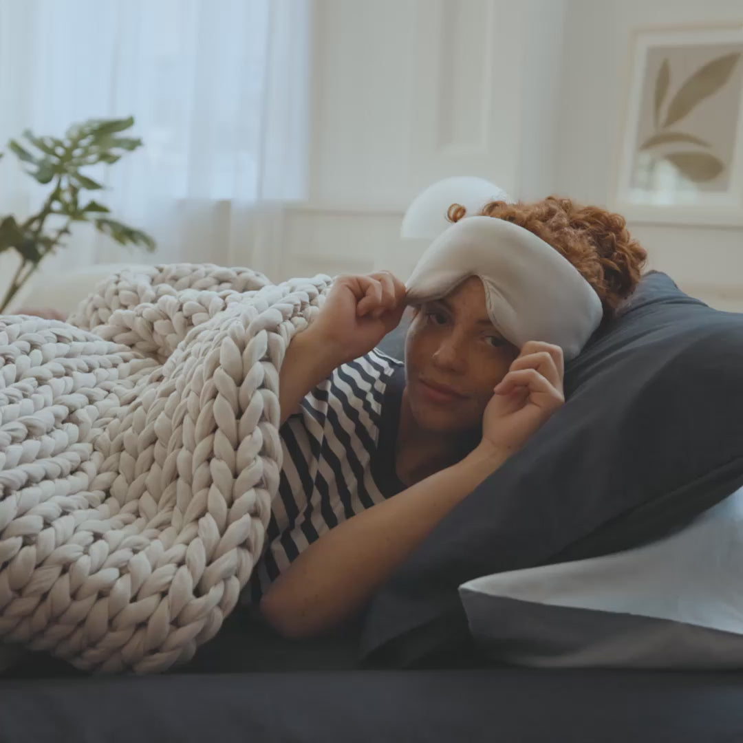 short video of women with eye mask and weighted blanket