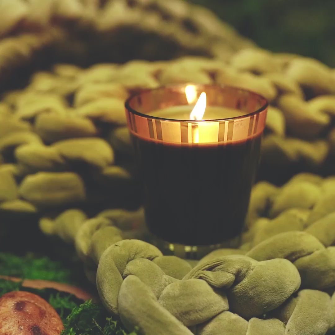 eco-velvet Napper paired with a NEST New York candle