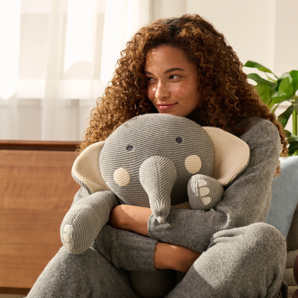 cuddling with AURTRS weighted elephant